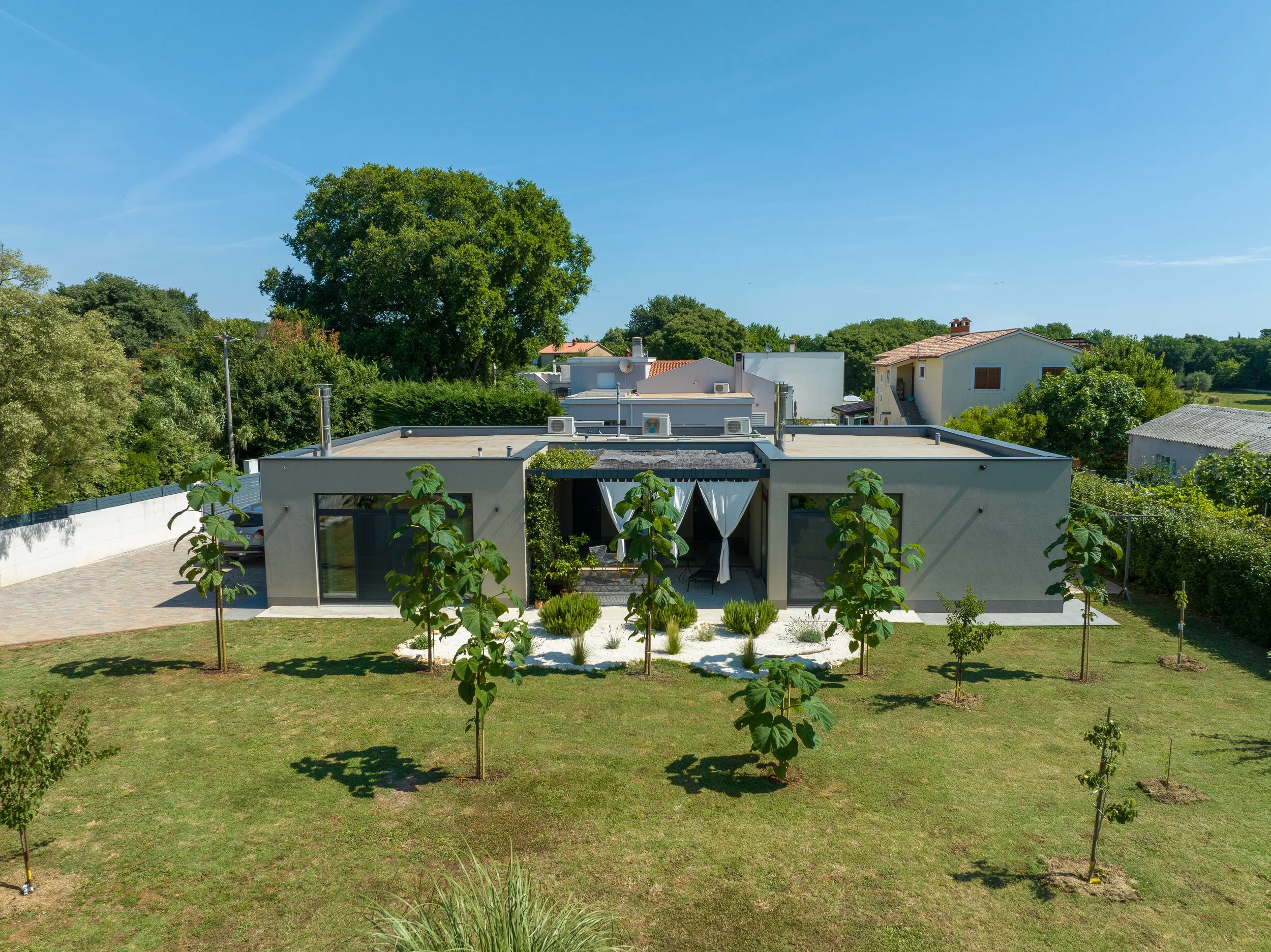 New-build house in Šišan — two apartments, one large plot 